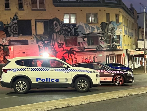 A police car stands by at the scene of a shooting incident at Bondi Beach, Sydney, Australia, December 14, 2025. REUTERS