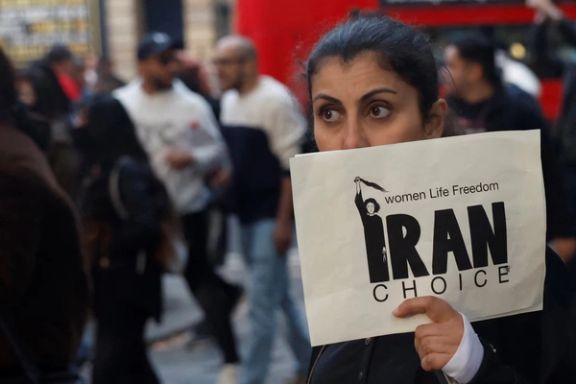 Protestors stand in solidarity with Iranian women after the death in custody of Mahsa Amini, in London, Britain September 24, 2022