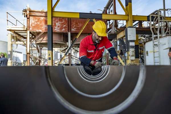 Iranian workers and consumers to bear cost of budget deficit, experts warn