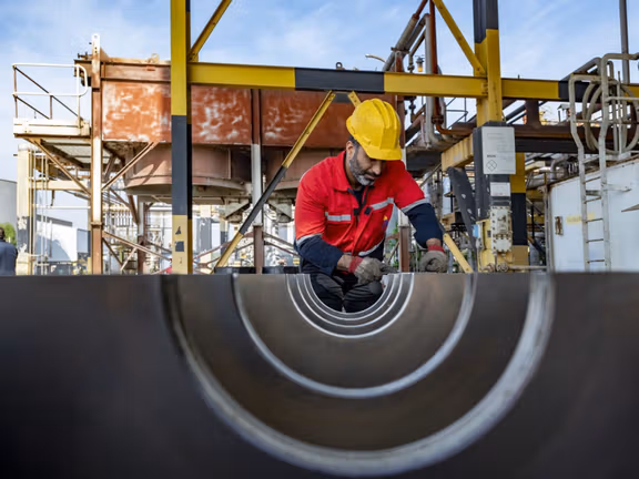 Iranian workers and consumers to bear cost of budget deficit, experts warn