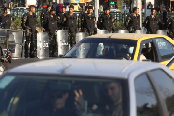 Iran's riot police forces stand in a street in Tehran, Iran, October 3, 2022.