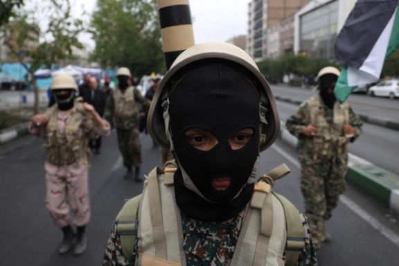 A member of Basij paramilitary forces attends a rally in support of Palestinians, in Tehran, Iran, October 13, 2023.
