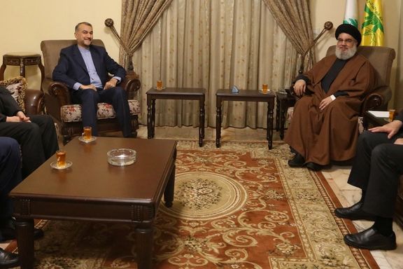 Lebanon's Hezbollah leader Seyyed Hassan Nasrallah meets with Iranian Foreign Minister Hossein Amir-Abdollahian in this handout picture in an unidentified location and released by Hezbollah Media Office on January 13, 2023.