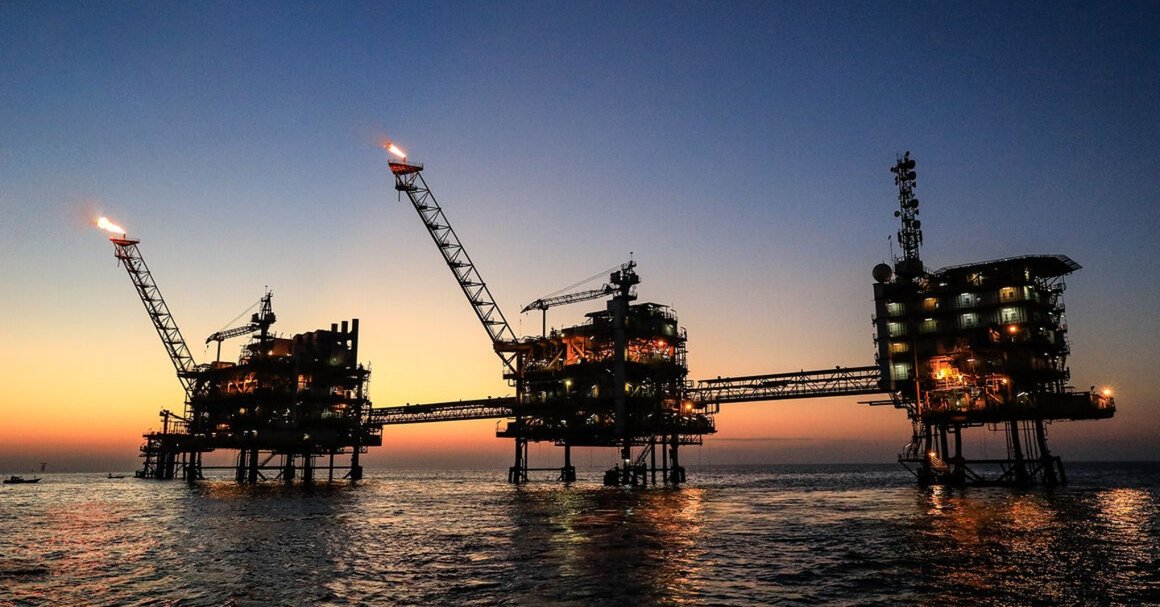 Iran state bank freezes national oil company accounts over debt