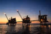 Iran state bank freezes national oil company accounts over debt