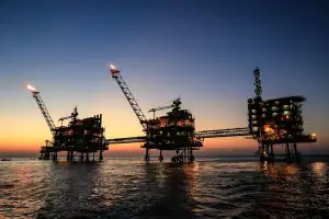 Iran state bank freezes national oil company accounts over debt