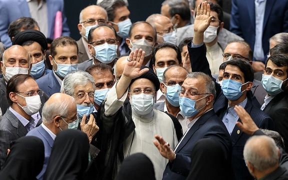 President Ebrahim Raisi with Hardliner supporters in parliament during his inauguration in August 2021