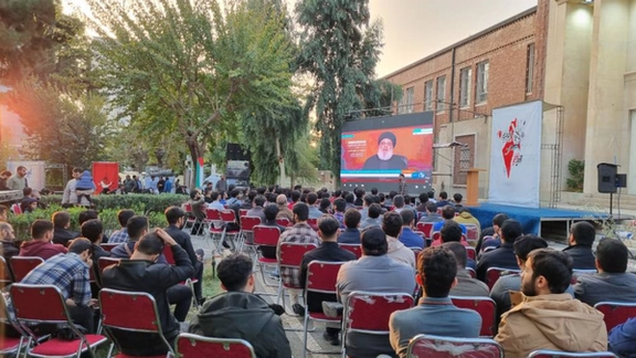 University students watching Hezbollah Secretary General Hassan Nasrallah's speech about the Israel-Hamas war in a regime-sponsored event in Tehran (November 2023)