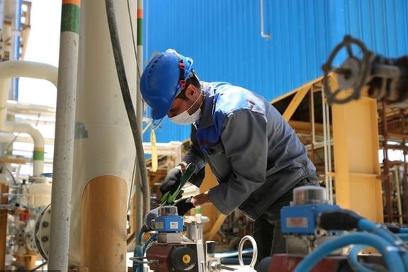 A worker in Esfahan's refinery in Iran. Undated