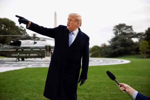US President Donald Trump speaks to reporters in front of the Marine One
