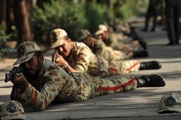 Several Iranian Army conscripts during training