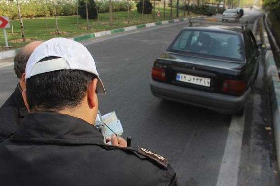 Senior Iranian MP apologizes publicly after son hits officer in bus lane