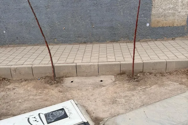 ماموران سپاه تابلوهای یادبود کیانوش سنجری را در بهشت زهرا برداشتند