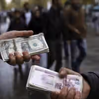 Iranians voice economic despair as dollar hits 2 million rials