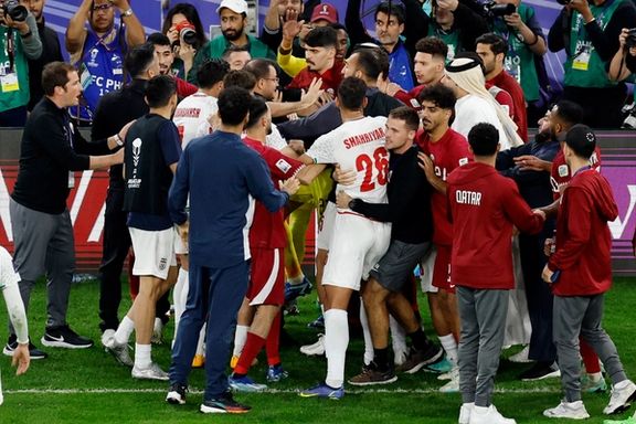 Iran and Qatar players clash after their semifinal match in Doha, Qatar - February 7, 2024. Iran lost the game 3-2.