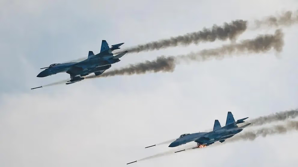 Russian Sukhoi Su-35 jet fighters firing missiles during the International Army Games 2021, at the Dubrovichi range outside Ryazan, Russia August 27, 2021