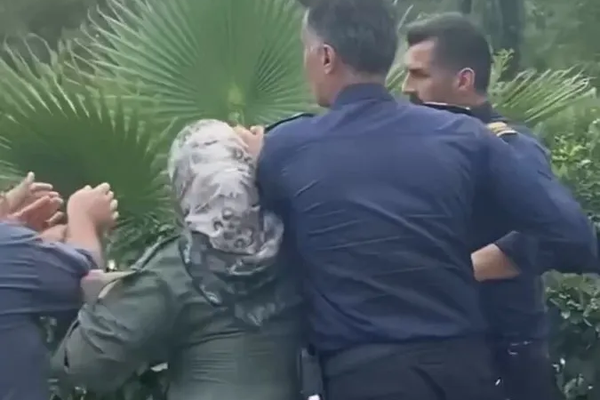 Security guards clash with visitors in northern Iran over compulsory hijab