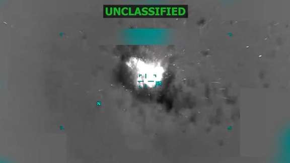 A boat burns off the coast of Venezuela in this screen grab taken from a video released October 14, 2025, depicting what U.S. President Donald Trump said on a post on Truth Social was a US strike on a suspected drug-trafficking boat. Donald Trump via Truth Social.