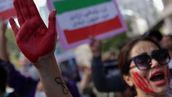 A demonstrator shouts slogans during a protest against the Iranian regime, following the death of Mahsa Amini, near the Iranian consulate in Istanbul, Turkey October 11, 2022.