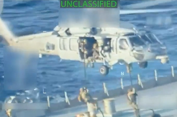 US coast guard executed a seizure warrant for a crude oil tanker used to transport sanctioned oil from Venezuela and Iran, December 10, 2025, Screen grab from official footage release