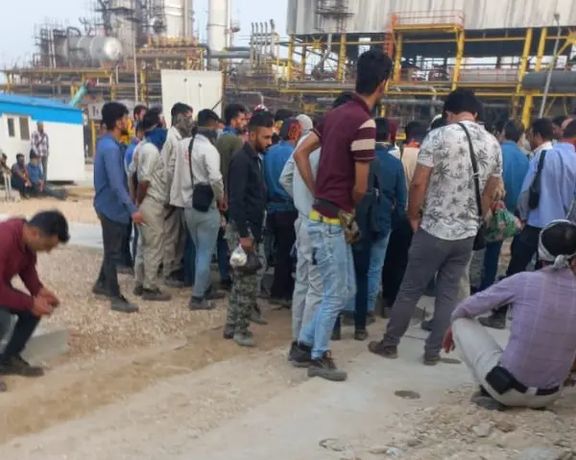 Workers on strike at an oil refinery