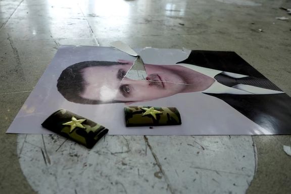 A damaged picture of Syria's Bashar al-Assad lies on the floor inside Qamishli international airport, after Syrian rebels announced that they have ousted Syria's Bashar al-Assad, in Qamishli, Syria December 9, 2024.