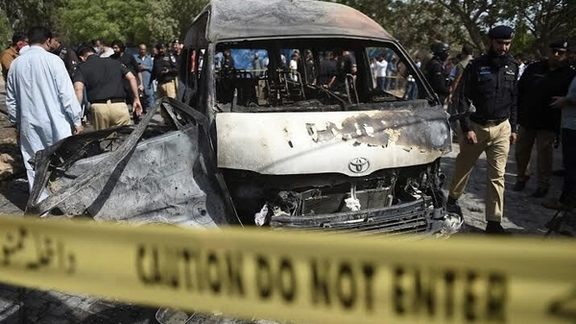 The site of a bomb blast in Karachi on May 12, 2022