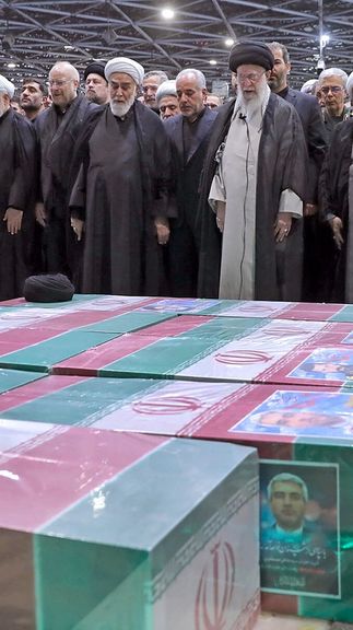 Iran's Supreme Leader Ali Khamenei performs prayer at a funeral for victims of helicopter crash that killed Iran's President Ebrahim Raisi, Foreign Minister Hossein Amir-Abdollahian and others, in Tehran, Iran, May 22,2024.