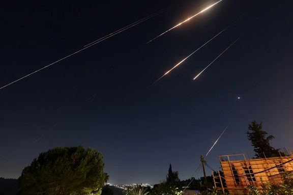 Missiles launched from Iran are seen from Jerusalem, June 13, 2025.