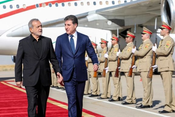 President of Kurdistan Region in Iraq, Nechirvan Barzani welcomes Iran's President Masoud Pezeshkian at Erbil International Airport, in Erbil, Iraq, September 12, 2024.