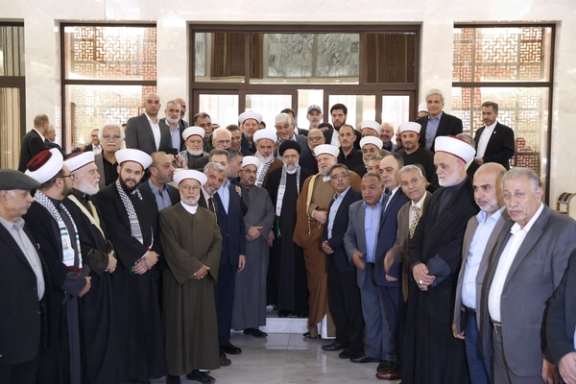 Iranian President Ebrahim Raisi during a meeting with representatives of militia groups in Syria on May 4, 2023