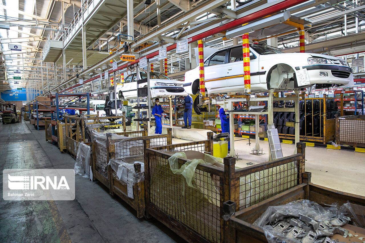 Workers on an automobile production line at a factory in Iran.
