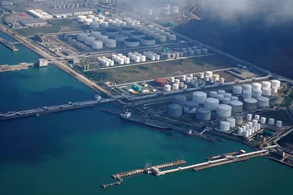 Oil and gas tanks are seen at an oil warehouse at a port in Zhuhai, China, in this file photo from October 2018.
