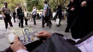 Iran's Liquidity, Debt Surge Under President Raisi