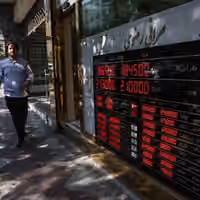 Tehran debates waiting out Trump’s economic war