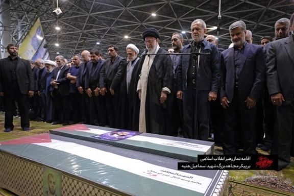 Khamenei praying at Haniyeh's funeral ceremony in Tehran on August 1, 2024