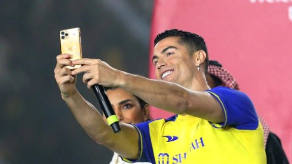 Portuguese forward Cristiano Ronaldo poses for a selfie during his unveiling at the Mrsool Park Stadium in the Saudi capital Riyadh on January 3, 2023.