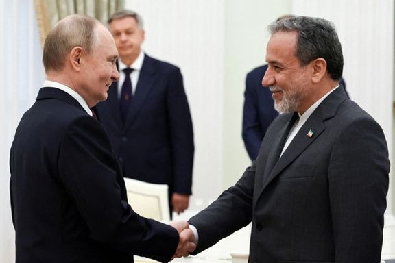 Russian President Vladimir Putin shakes hands with Iranian Foreign Minister Abbas Araqchi during a meeting at the Kremlin in Moscow, Russia June 23, 2025.