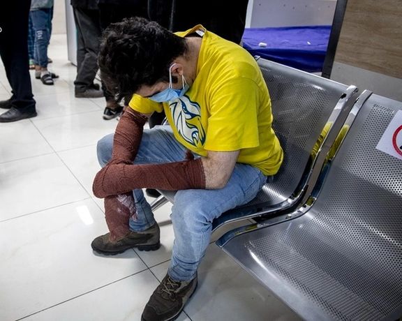 An man injured during the Iranian fire festival on March 15, 2022