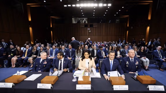 US director of national intelligence Tulsi Gabbard appears at a congressional hearing alongside other intelligence leaders, Mar. 25 2025
