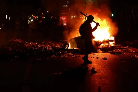 Iranians react to French protests with ‘karma’ and memories of 1979 revolution