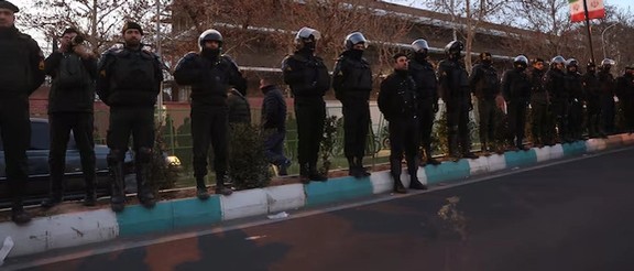 Members of the Iranian police stand guard at a protest in front of the British embassy following anti-government protests in Tehran, Iran, January 14, 2026