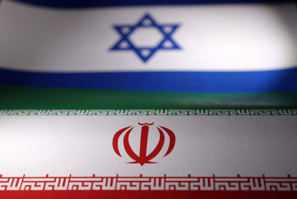  Israeli and Iranian flags are seen in this illustration taken, April 24, 2024. 