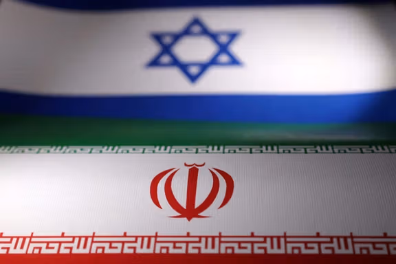 Israeli and Iranian flags are seen in this illustration taken, April 24, 2024.