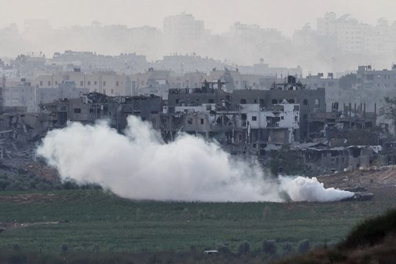 An Israeli tank manoeuvres inside the Gaza Strip, as seen from Israel, October 29, 2023.