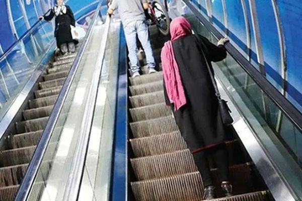 Iranian woman dies after hijab gets caught in escalator in Tehran