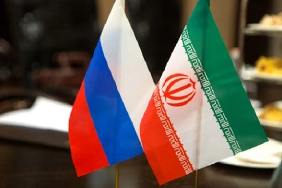 Russia (L) and Islamic Republic's flag (R)