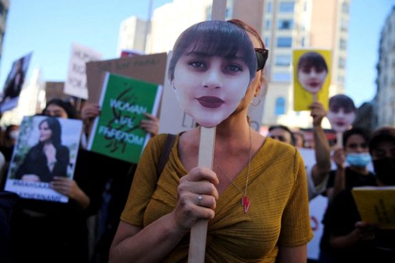 Protesters gather in support of Iranian women and against the death of Mahsa Amini at Callao square in Madrid, Spain, October 1, 2022.