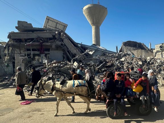 Displaced Palestinians return to their homes in Khan Younis, in the southern Gaza Strip November 24, 2023.