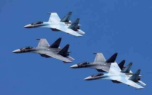 Sukhoi Su-35 jet fighters of the "Sokoly Rossii" (Falcons of Russia) aerobatic team fly in formation during a rehearsal for the airshow in Krasnoyarsk, Russia August 1, 2019.